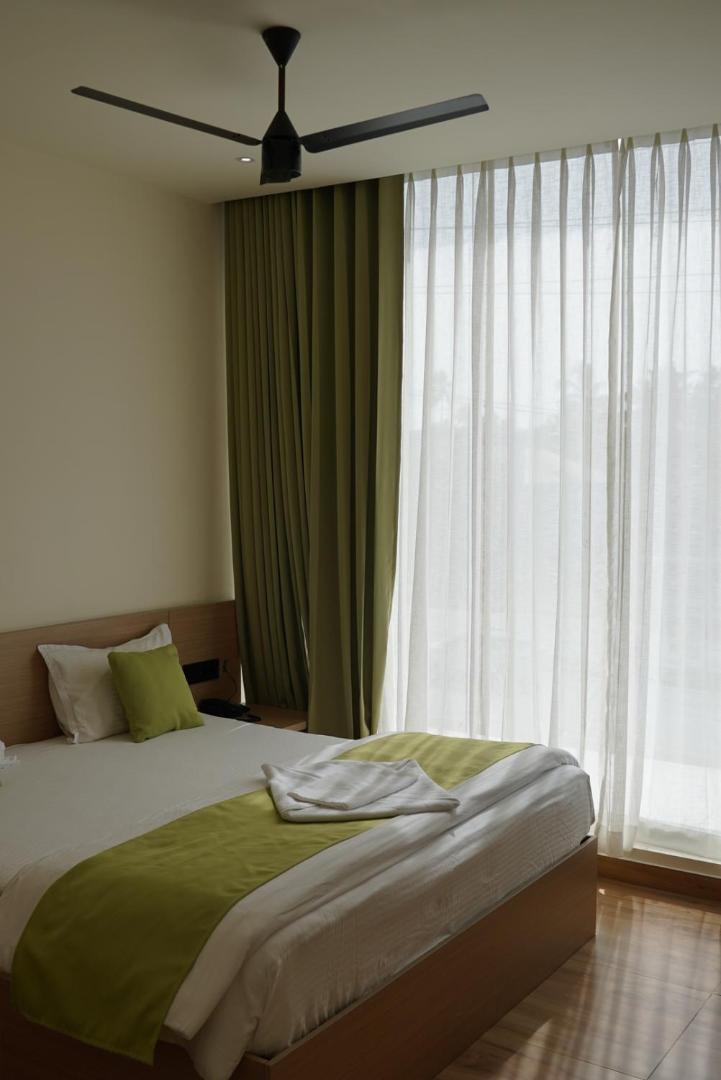 Dn Hotel Kochi Buitenkant foto