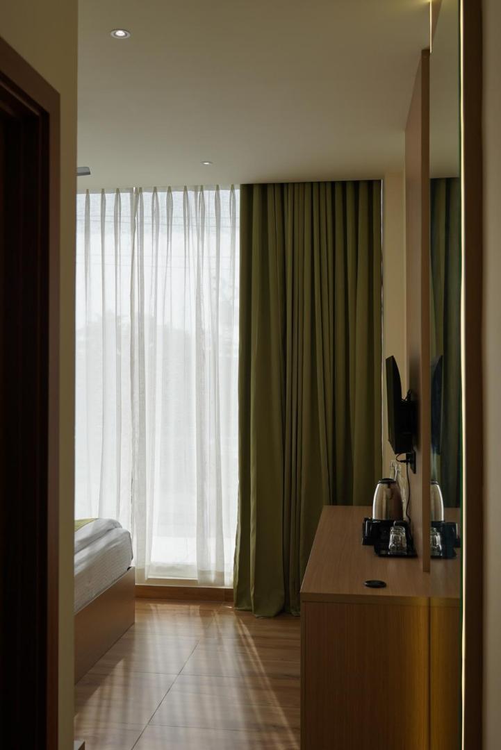 Dn Hotel Kochi Buitenkant foto